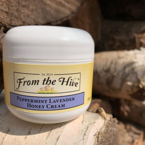 50ml(2oz) white plastic double wall jar with round base and white dome cap of our Peppermint Lavender Honey face and hand cream.