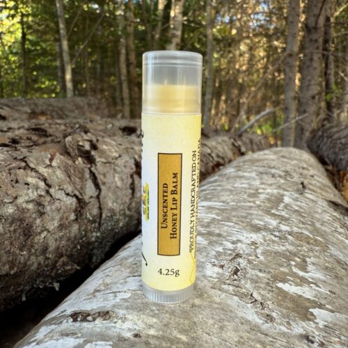 4.25g clear lip balm tube with twisted cap near bottom for easy access. Unscented with added shea butter, apricot kernel, beeswax, avocado, jojoba and vitamin E