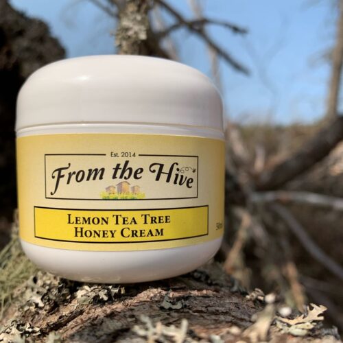 Lemon Tea Tree Honey face and hand cream. 50ml(2oz) white plastic double wall jar with round base and white dome cap .