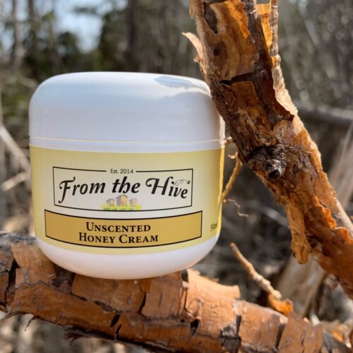 Unscented Honey face and hand cream. 50ml(2oz) white plastic double wall jar with round base and white dome cap .
