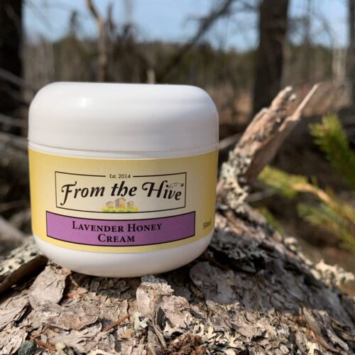 Lavender Honey face and hand cream. 50ml(2oz) white plastic double wall jar with round base and white dome cap.
